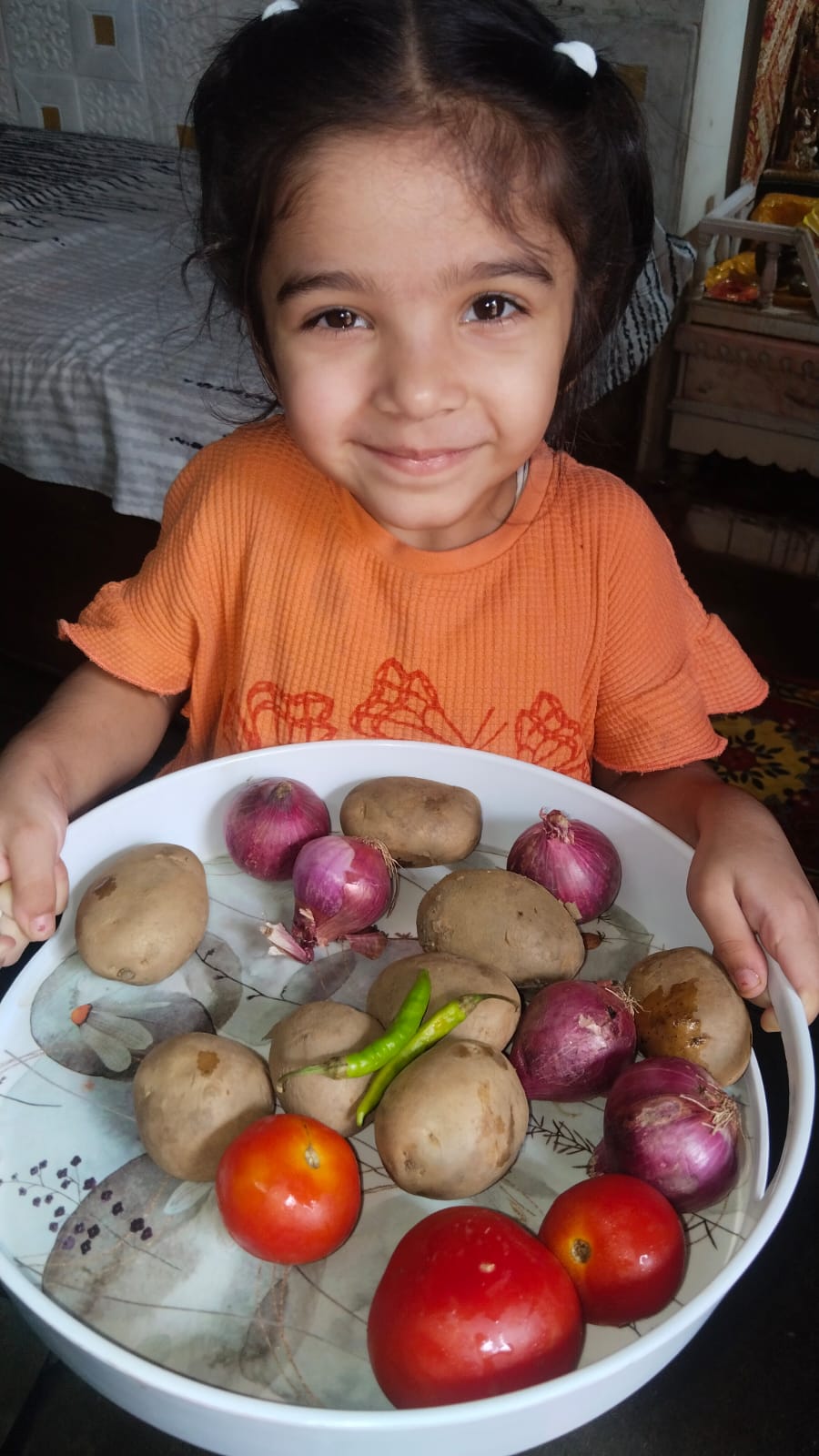 Kindergarten kid showcasing healthy recipe