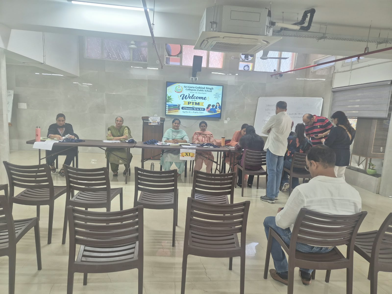 Parents meeting teachers during the school PTM