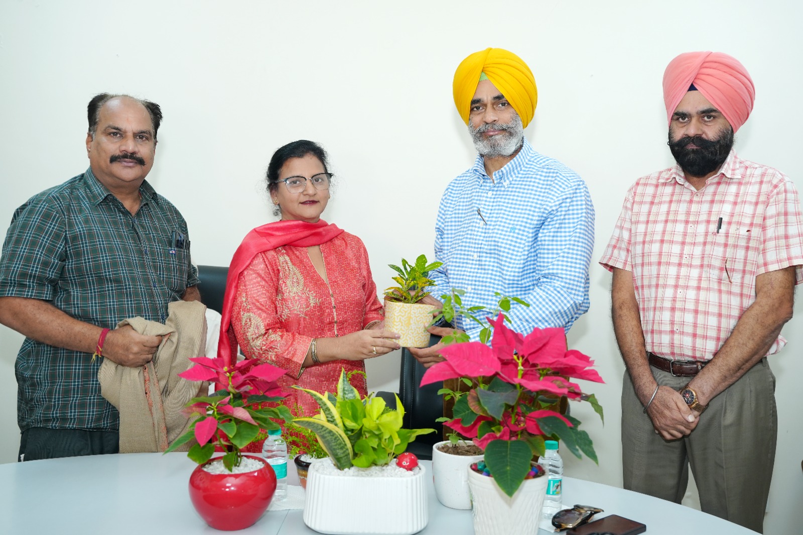 Principal and faculty members with the new SES President